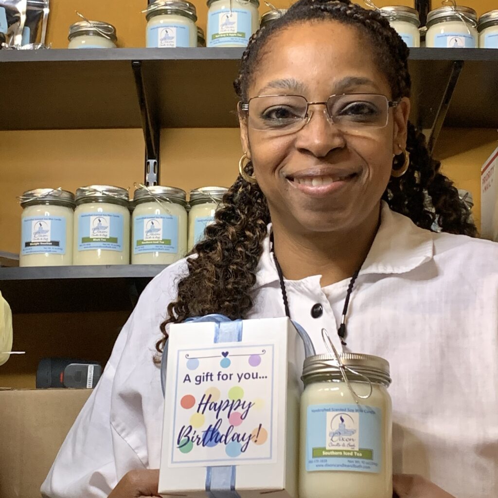 Sonia Dixon holding her products