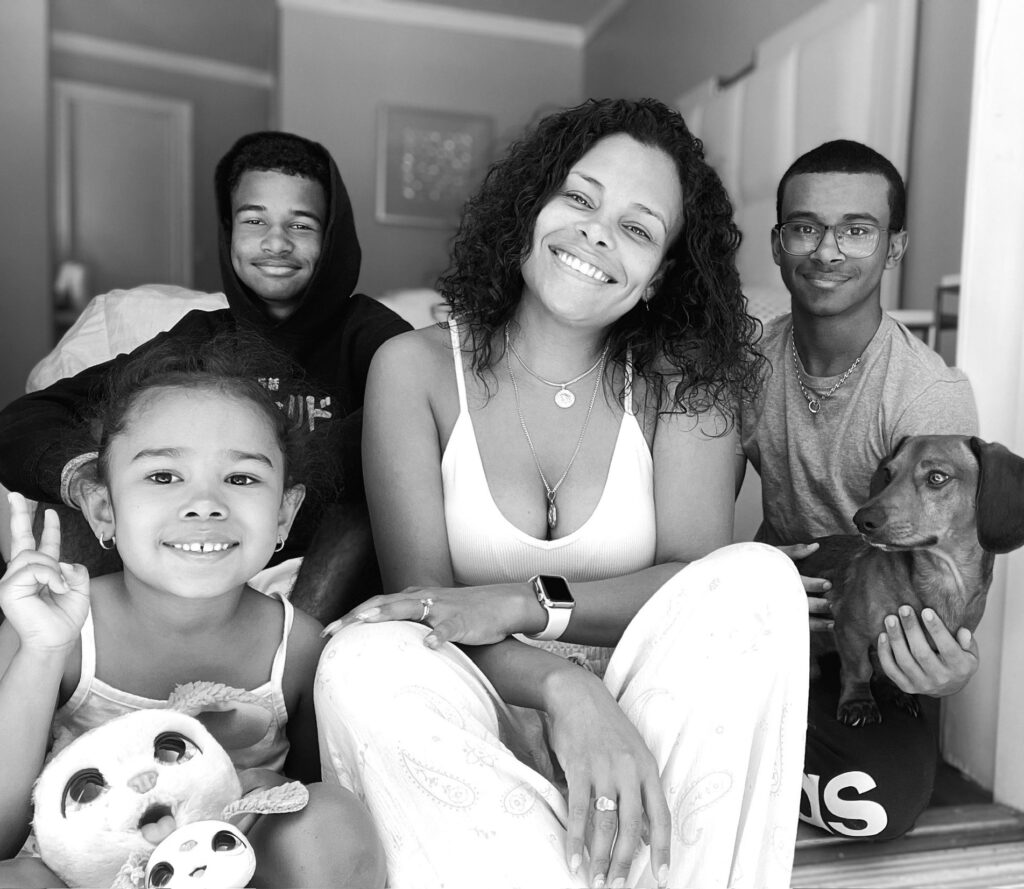 Tiffiny Williams with her children in black and white photo