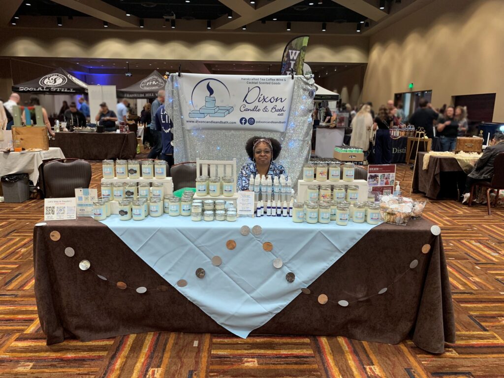 Sonya's table of her bath products at an event